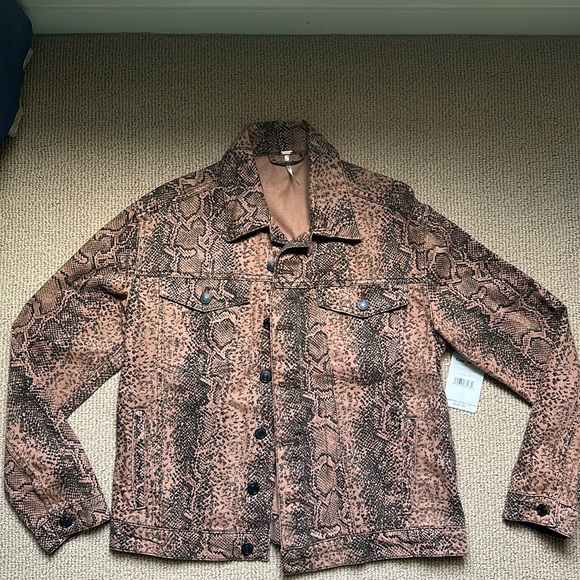 Free people snakeskin denim jacket runs big S-M